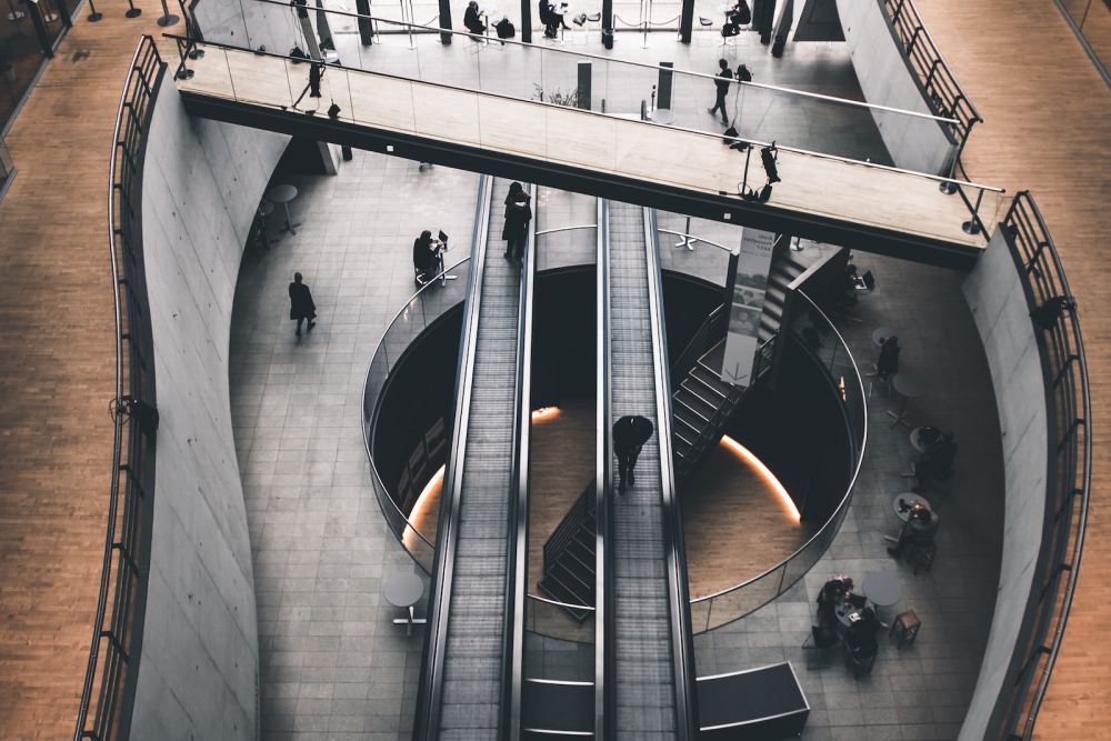 Professional website design with a minimalist approach, featuring escalators moving in different directions.